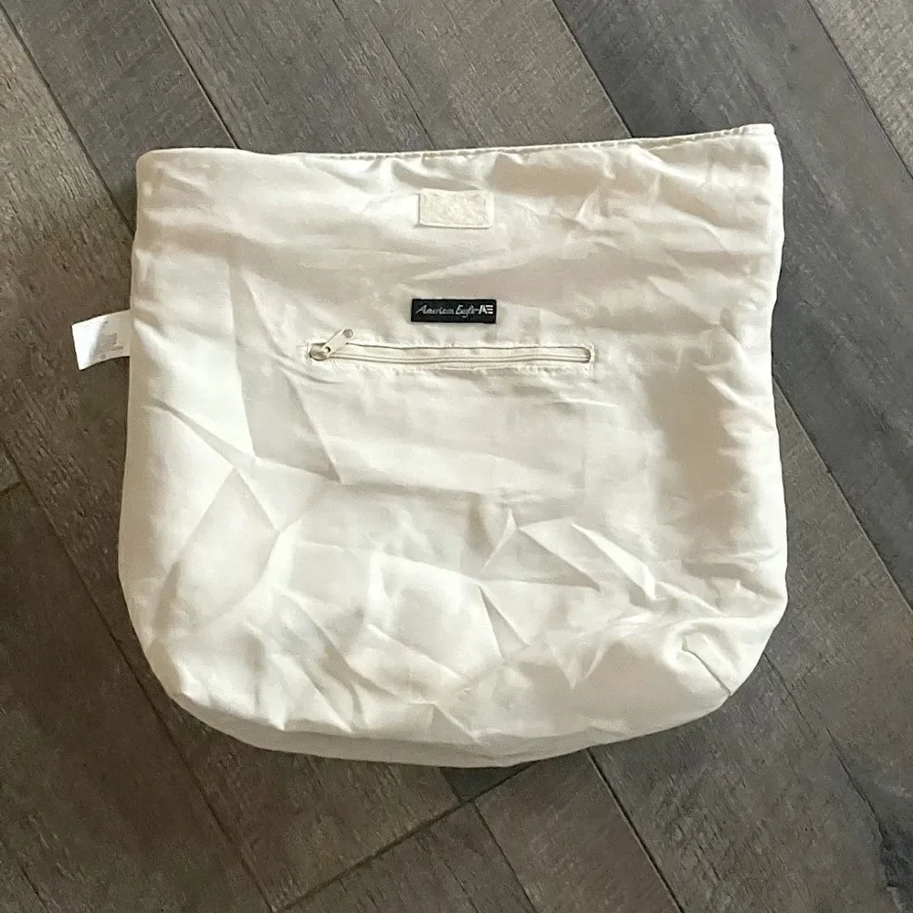 American Eagle Striped Bag. 14 x 10.5 inches, multiple pockets.